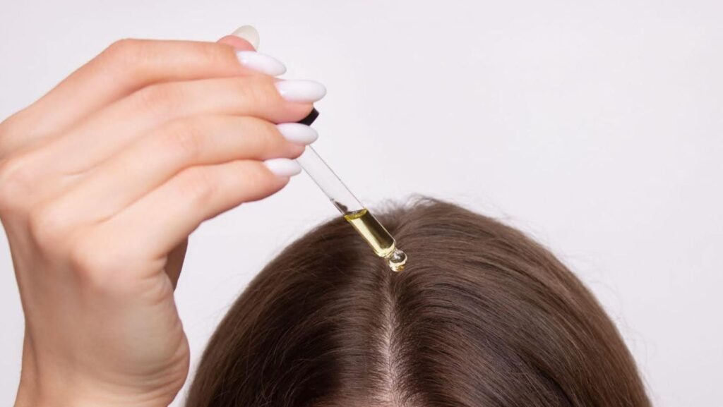 A woman using castor oil and wondering why shouldn't you use castor oil packs during menstruation.